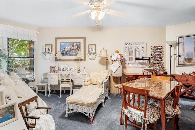 dining room featuring ceiling fan and carpet floors