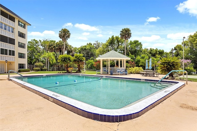 view of swimming pool with a gazebo