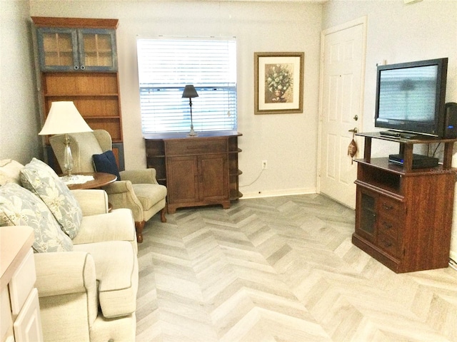 living room featuring light parquet flooring