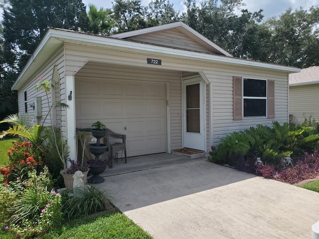 single story home featuring a garage