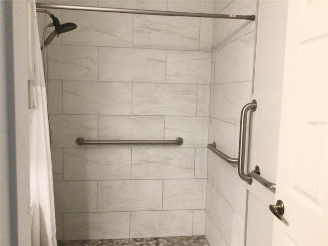 bathroom with a shower with shower curtain