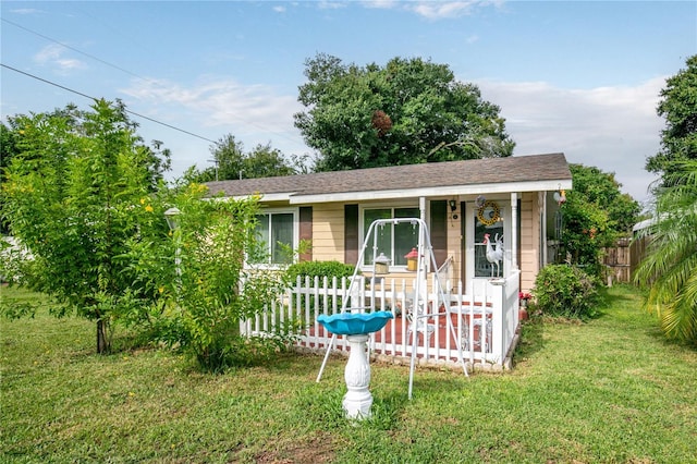 view of front of home with a front yard