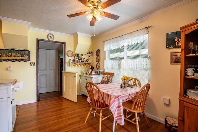 dining room with crown molding, a textured ceiling, hardwood / wood-style flooring, and ceiling fan