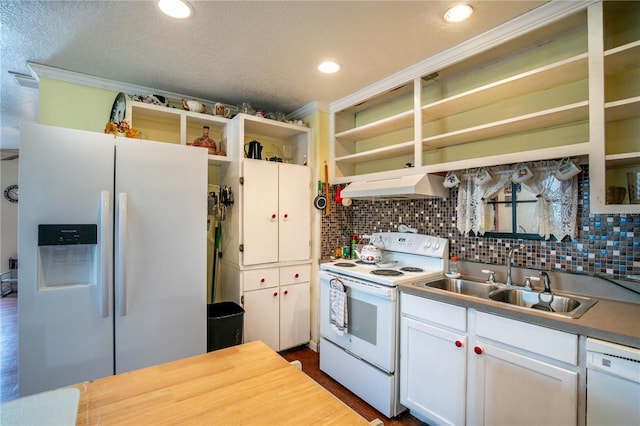 kitchen with custom range hood, sink, white appliances, and tasteful backsplash