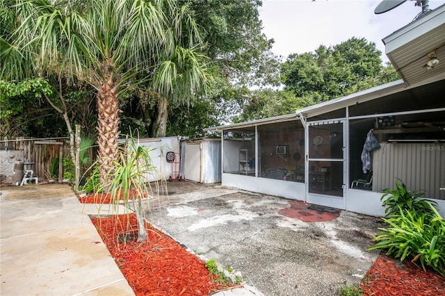 view of patio / terrace with a sunroom