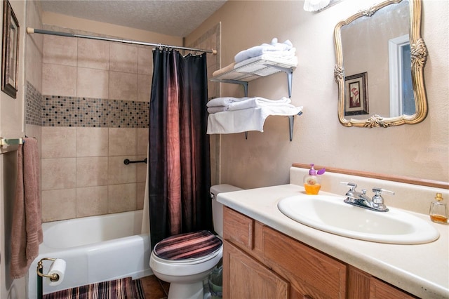 full bathroom with vanity, toilet, shower / bath combo, and a textured ceiling