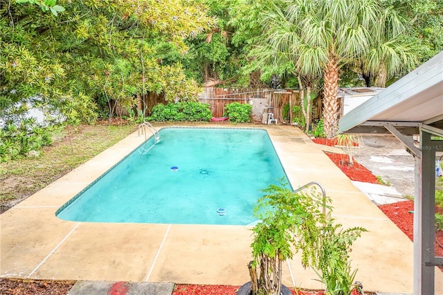 view of pool featuring a patio area