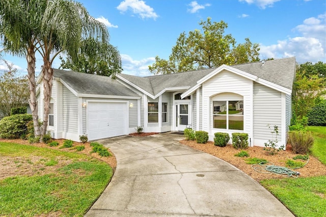 single story home featuring a garage