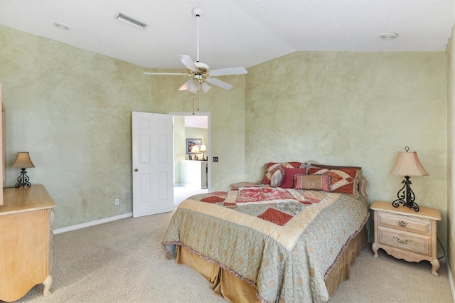 carpeted bedroom with lofted ceiling and ceiling fan