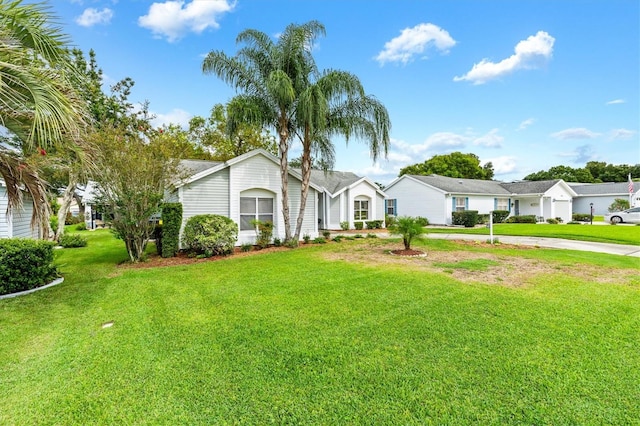 ranch-style house featuring a front yard