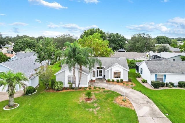 ranch-style house featuring a front lawn