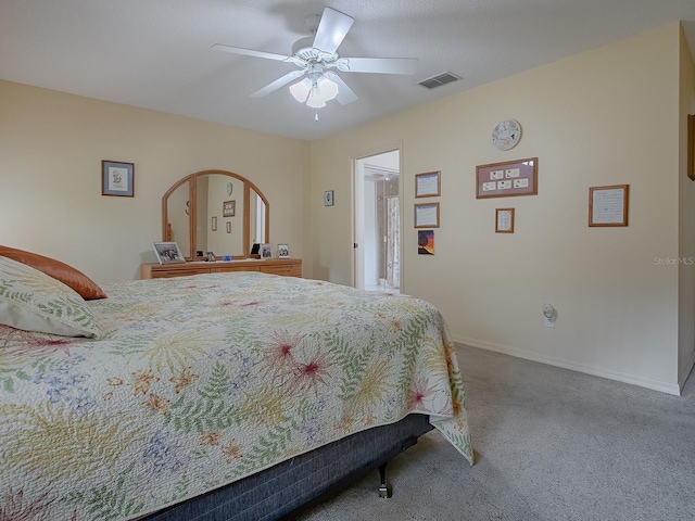 bedroom featuring ceiling fan and carpet flooring