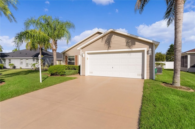 view of front of property with a garage and a front lawn