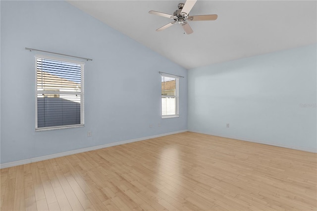 unfurnished room featuring ceiling fan, light wood-type flooring, and high vaulted ceiling