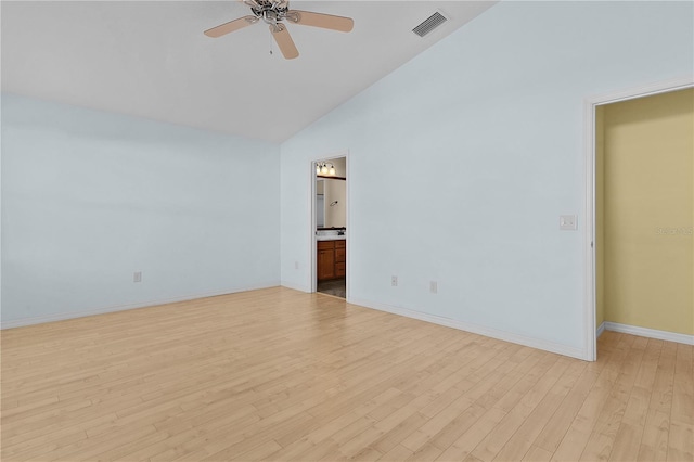 spare room featuring ceiling fan, light hardwood / wood-style flooring, and high vaulted ceiling