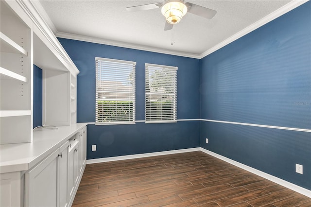 spare room with crown molding, ceiling fan, dark hardwood / wood-style floors, and a textured ceiling