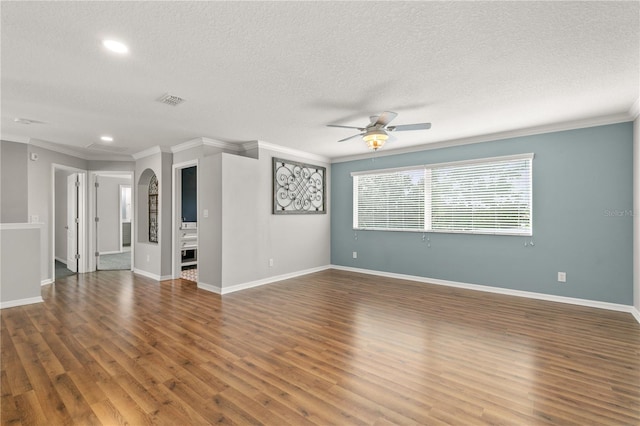 unfurnished living room with a textured ceiling, crown molding, hardwood / wood-style floors, and ceiling fan