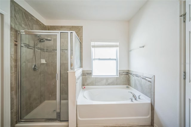 bathroom featuring plus walk in shower