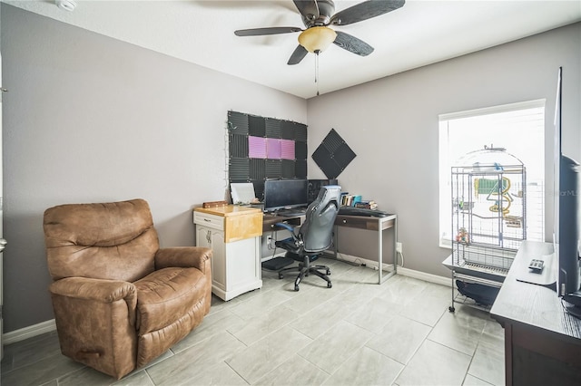 tiled home office with ceiling fan