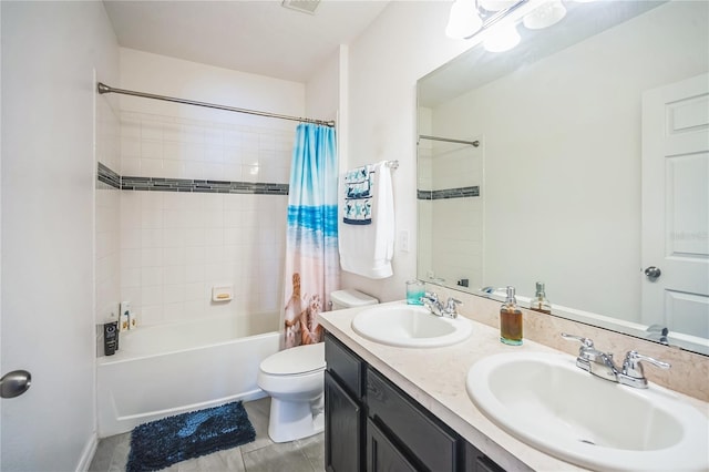 full bathroom with shower / bath combination with curtain, vanity, and toilet