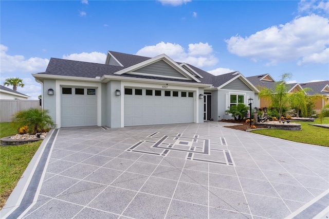 ranch-style home featuring a garage