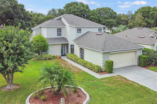 traditional-style home with stucco siding, a front lawn, concrete driveway, an attached garage, and a shingled roof