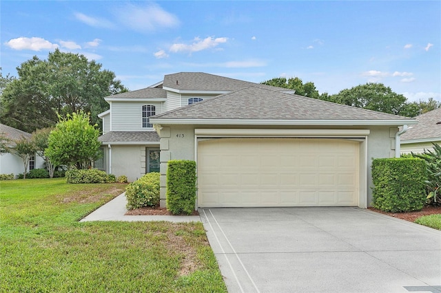 view of front of property with a front yard, driveway, stucco siding, a shingled roof, and a garage