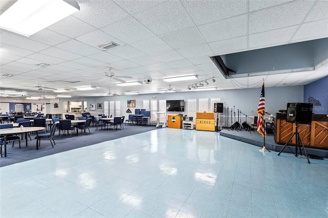 interior space featuring ceiling fan