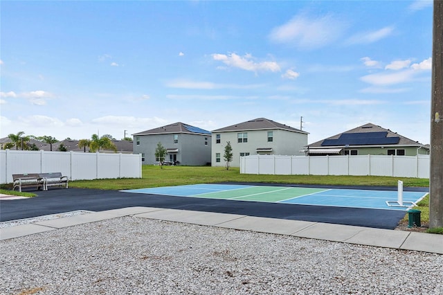 exterior space featuring a yard and fence