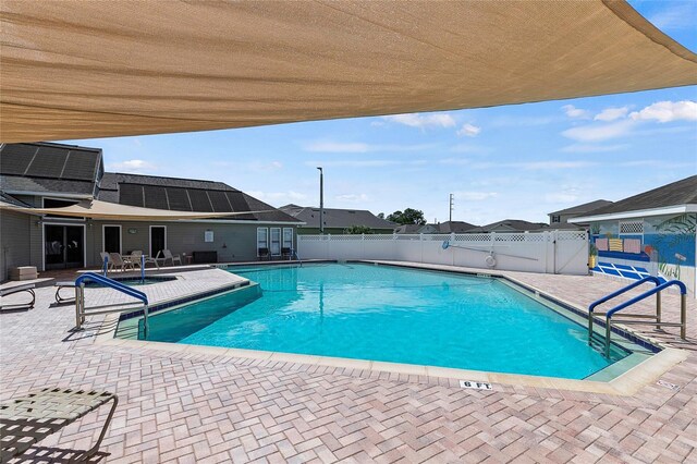 view of swimming pool featuring a patio