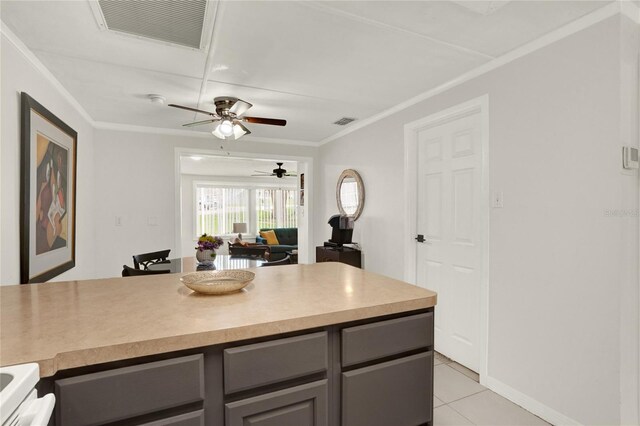 kitchen featuring white range, light tile patterned floors, crown molding, gray cabinets, and ceiling fan