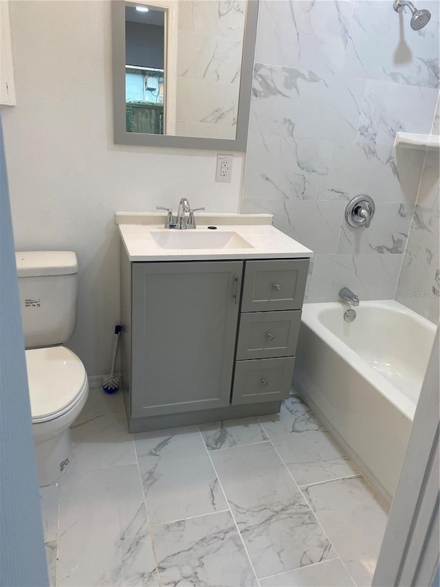 full bathroom featuring toilet, shower / washtub combination, and vanity