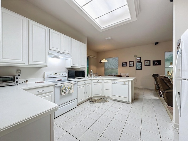 kitchen with pendant lighting, kitchen peninsula, white cabinetry, and white appliances