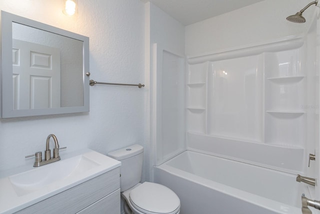 full bathroom with vanity, shower / washtub combination, and toilet