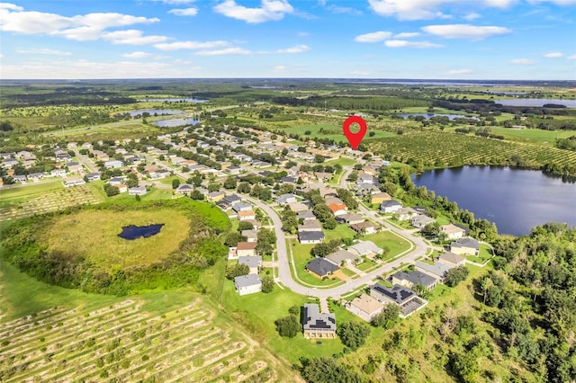 aerial view featuring a rural view and a water view