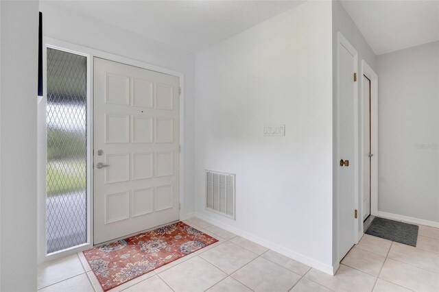 view of tiled foyer