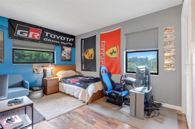 bedroom with wood-type flooring