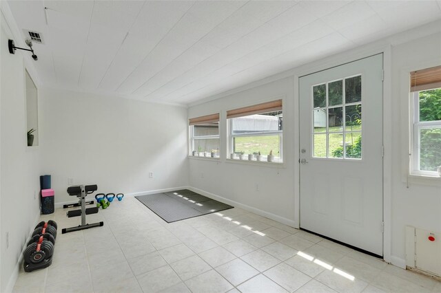 interior space featuring light tile patterned floors