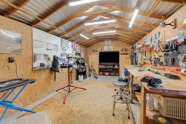 misc room featuring wood ceiling, lofted ceiling with beams, and a workshop area