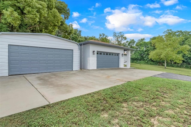 garage featuring a yard