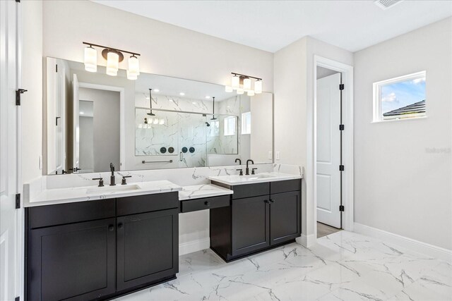 15607 Vetta Dr, Montverde, FL 34756 - full bath with marble finish floor, a healthy amount of sunlight, a marble finish shower, and vanity
