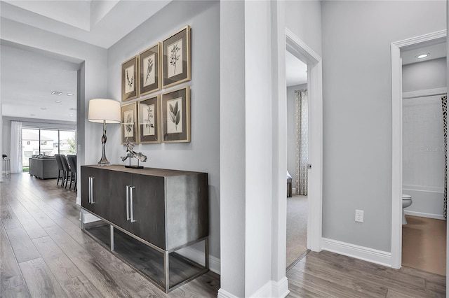 corridor featuring hardwood / wood-style flooring