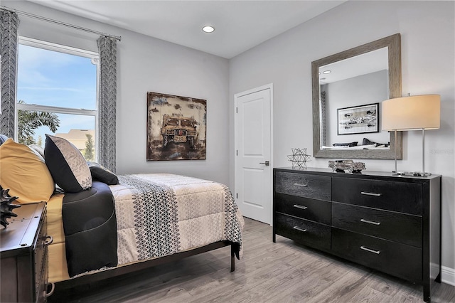 bedroom featuring light hardwood / wood-style flooring