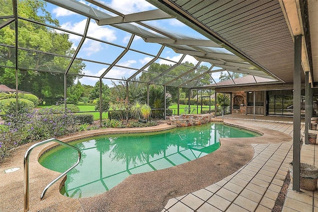 view of pool featuring a lanai and a patio area