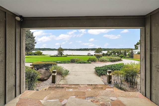 view of patio featuring a water view