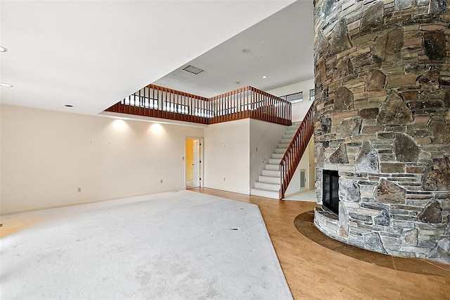 unfurnished living room featuring a fireplace