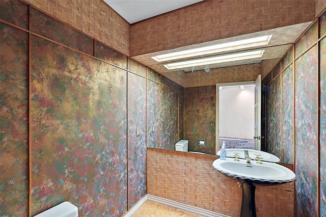 bathroom featuring a skylight