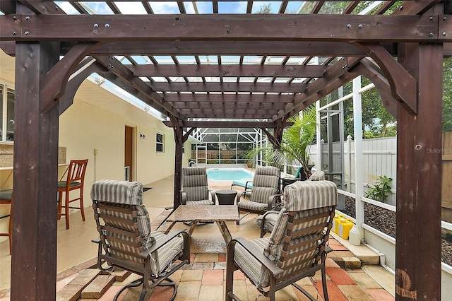 view of patio with outdoor lounge area and a pergola