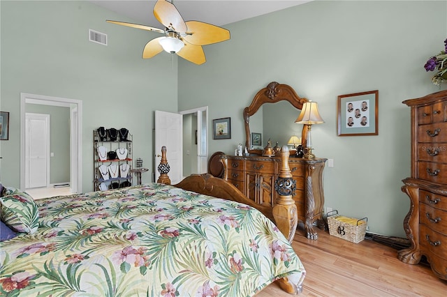 bedroom featuring ceiling fan and light hardwood / wood-style flooring