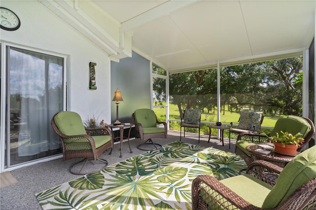 sunroom with vaulted ceiling